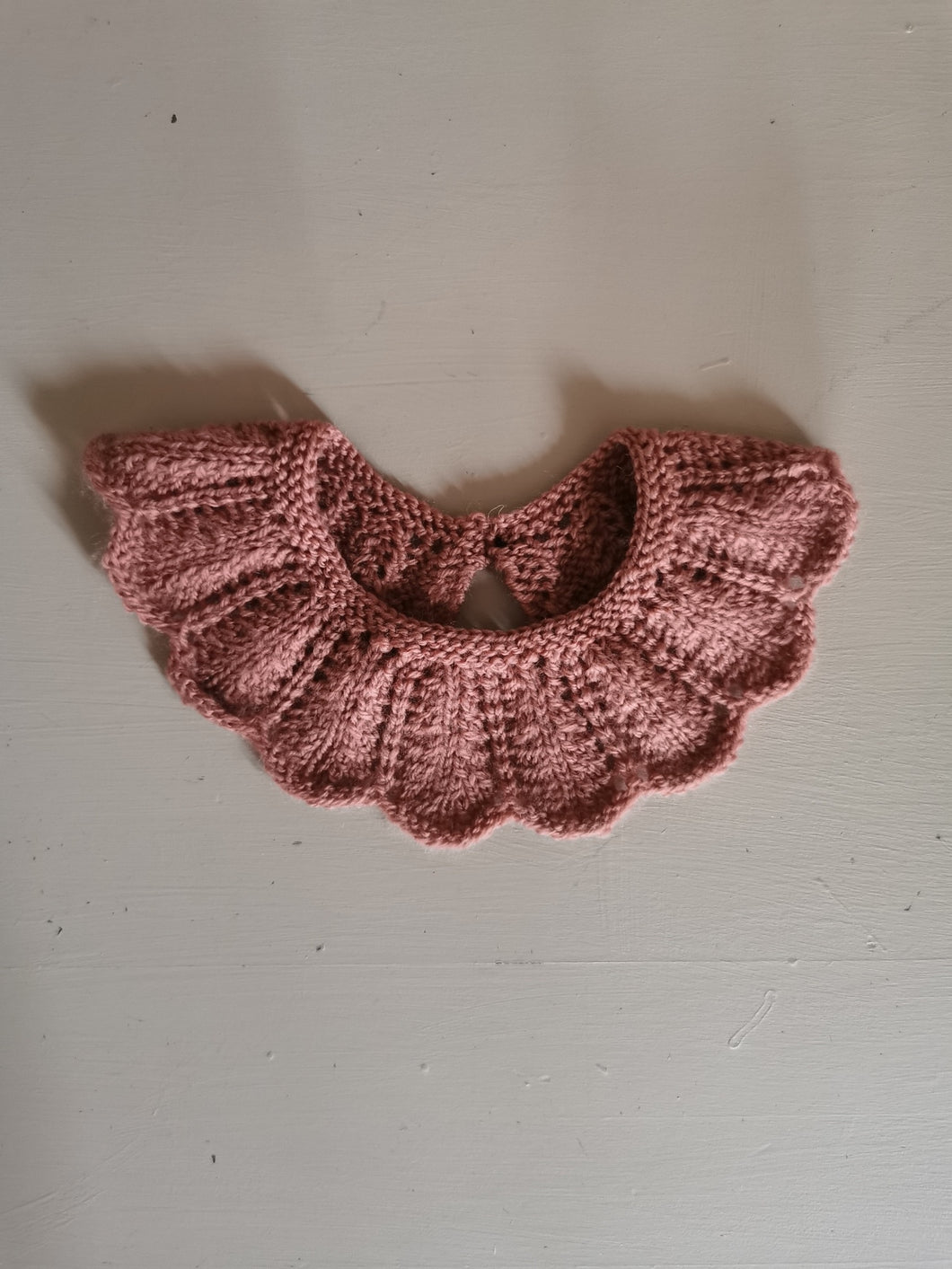 Pyntekrave, merinould, gammelrosa